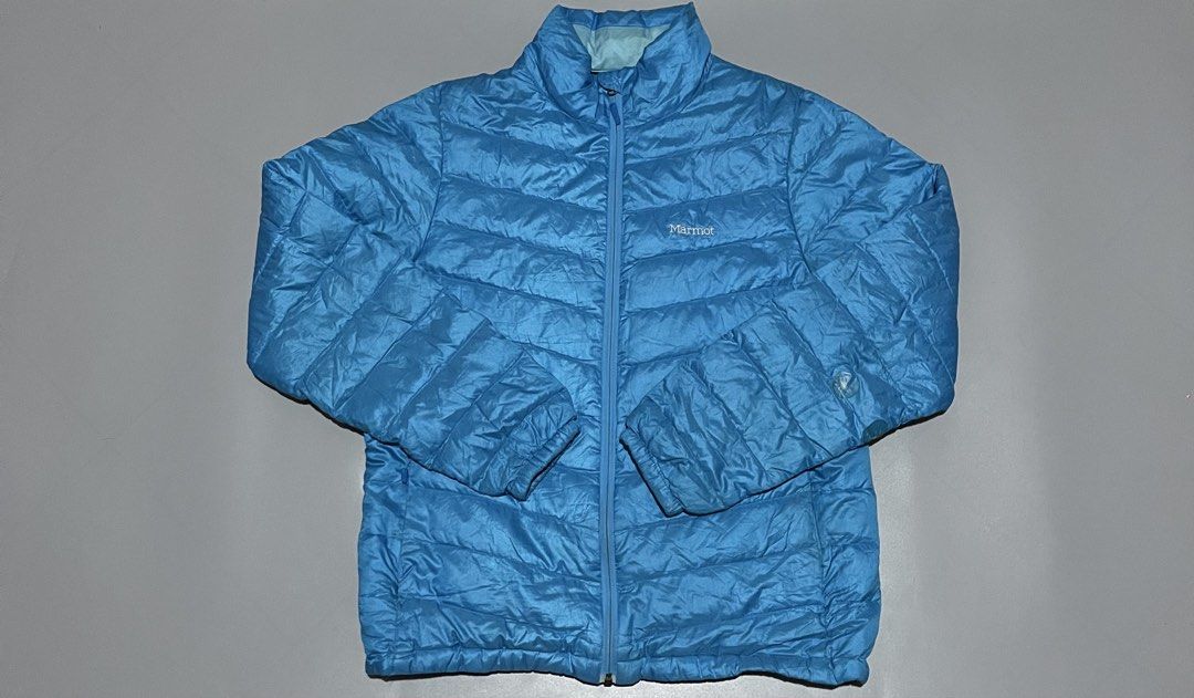 Marmot Zip-Up Puffer Jacket (Category: Activewear) located in Angeles City. Submitted by andreiboughts (Listing ID 1430814653, Image 1). Description: Length: 27 Width: 21-22 Condition: 9/10 Color rate: 10/10 Issue (s): Scratches and repaired parts Complete Tags ✅ XL on tag.