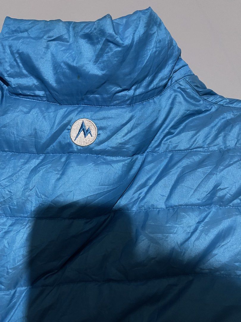 Marmot Zip-Up Puffer Jacket (Category: Activewear) located in Angeles City. Submitted by andreiboughts (Listing ID 1430814653, Image 3). Description: Length: 27 Width: 21-22 Condition: 9/10 Color rate: 10/10 Issue (s): Scratches and repaired parts Complete Tags ✅ XL on tag.