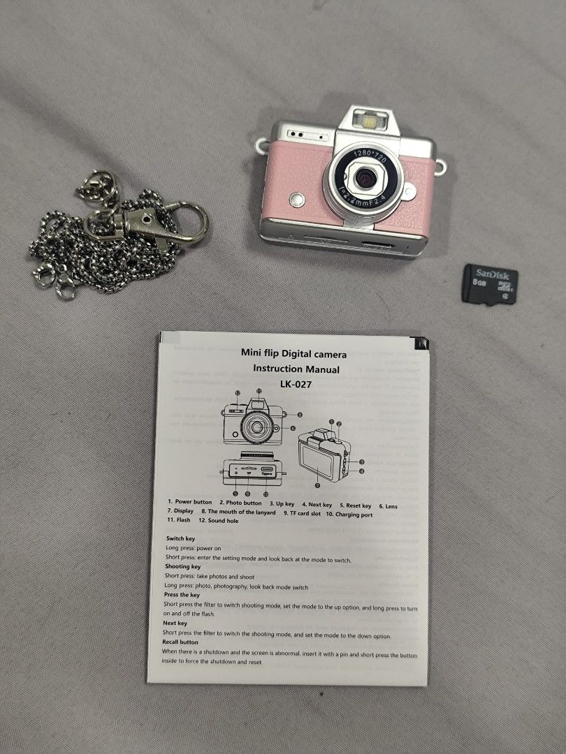 Mini Flip Digital Camera LK-027 w/ 8GB SD Card (Category: Cameras) located in Manila. Submitted by homewarefinds.ph (Listing ID 1430897652, Image 2). Description: Package Includes: 📸Mini Flip Digital Camera 📸8GB SD Card 📸Instruction Manual 📸Silver Neck Chain Features: ✨48 Megapixels ✨Various Filters ✨Front & Back Camera ✨Picture or Video Mode ✨Type-C Charging Port ✨SD Card Slot ✨Flash Colors Available: 🤍Green 🤍Pink 🤍Blue 🤍Black 🤍Purple.