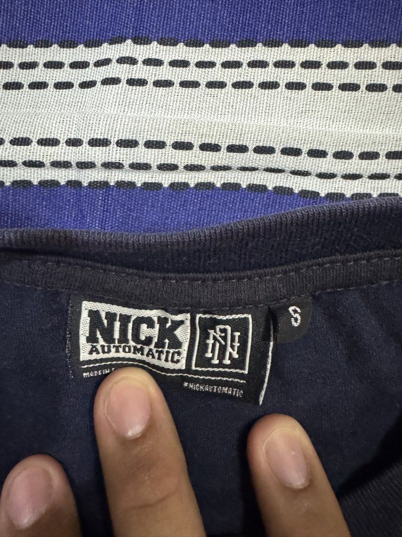 Nick Automatic World Domination T-shirt (Category: Tshirts & Polo Shirts ) located in Bacoor. Submitted by brianluistro (Listing ID 1430871714, Image 3). Description: - Navy blue Nick Automatic T-shirt - Features "World Domination" graphic (front and back) - Short sleeves, crew neck - Size: Small - Made in the Philippines.