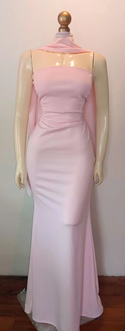 Pink Strapless Evening Gown with Shawl (Category: Evening dresses & gowns) located in Manila. Submitted by sonummy (Listing ID 1430913663, Image 2). Description: - Strapless pink evening gown - Fitted bodice - Flowing mermaid skirt - Floor-length - Includes matching shawl - Suitable for formal events and special occasions - Made of smooth, thick stretchy fabric.