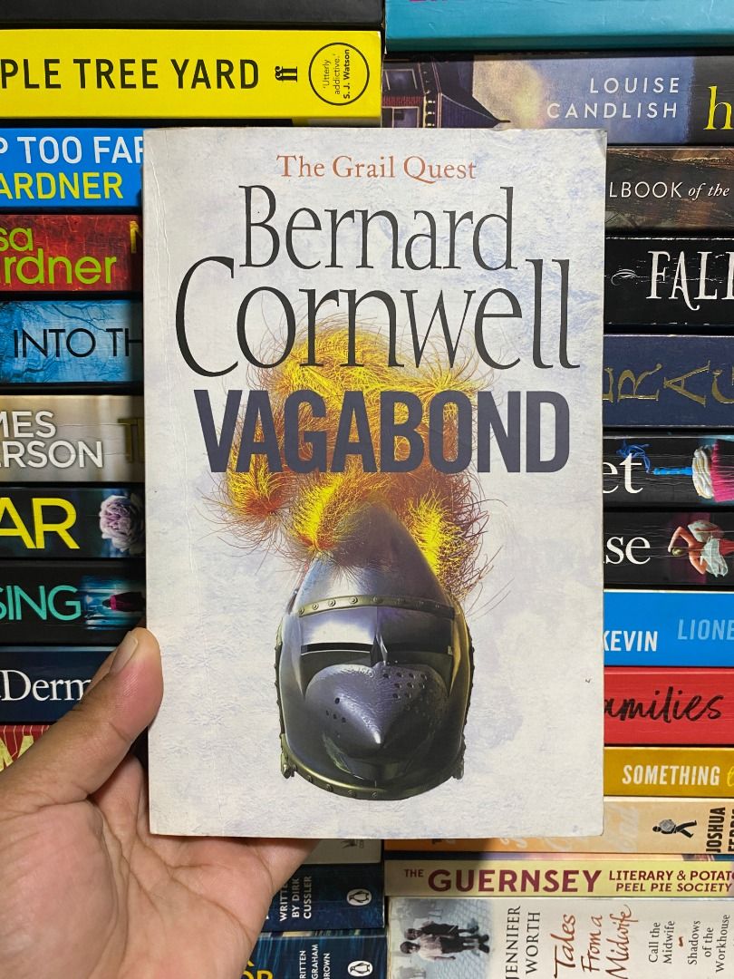 (Preloved) Vagabond by Bernard Cornwell (Category: Storybooks) located in Urdaneta. Submitted by hos24 (Listing ID 1430874842, Image 1). Description: Book is titled "The Grail Quest: Vagabond" by Bernard Cornwell. .