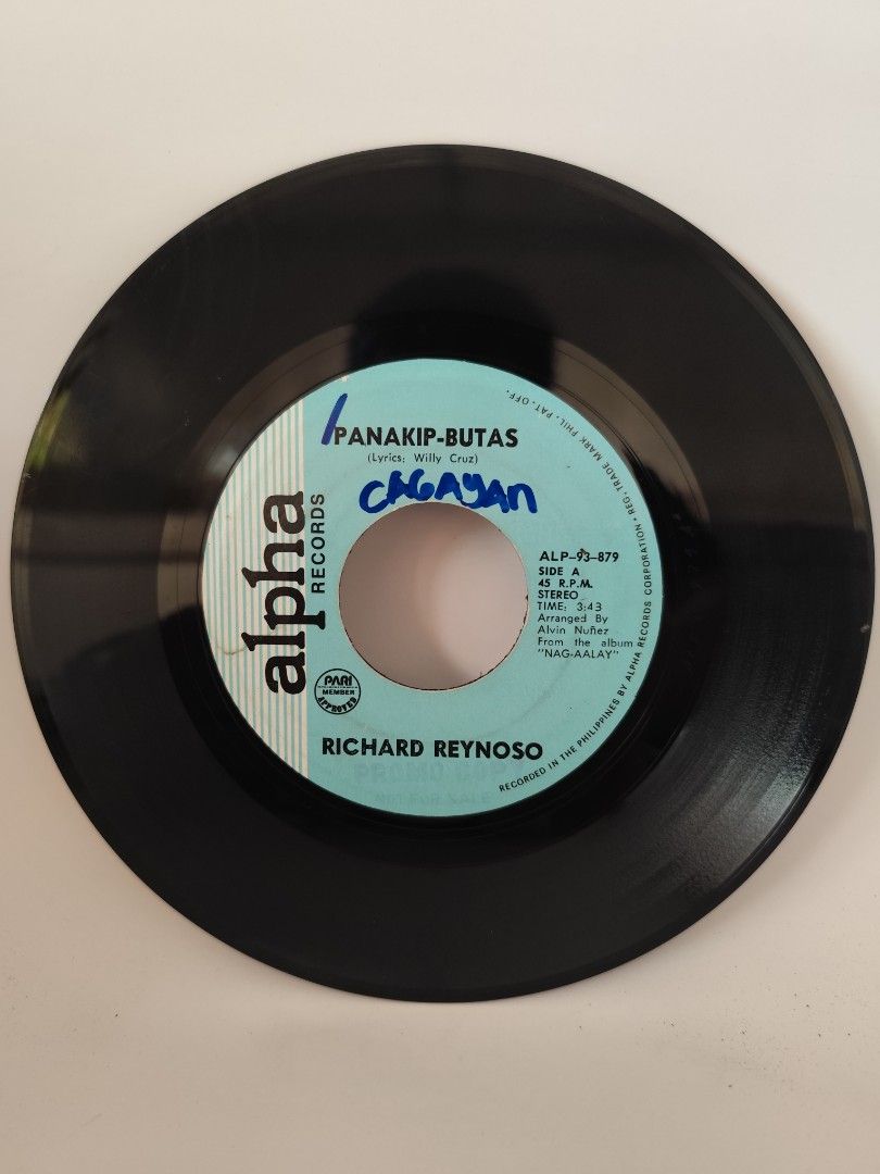 Richard Reynoso Vinyl Record (Category: Vinyls) located in Davao. Submitted by pasio (Listing ID 1430874502, Image 1). Description: Vintage vinyl record by Richard Reynoso. Features the songs "Panakip-Butas" and "Ikaw Ang Mahal". Released by Alpha Records. The record is a 7-inch single. The label indicates it is a stereo recording..