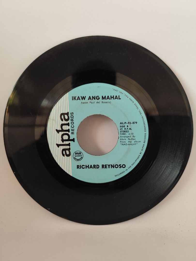 Richard Reynoso Vinyl Record (Category: Vinyls) located in Davao. Submitted by pasio (Listing ID 1430874502, Image 2). Description: Vintage vinyl record by Richard Reynoso. Features the songs "Panakip-Butas" and "Ikaw Ang Mahal". Released by Alpha Records. The record is a 7-inch single. The label indicates it is a stereo recording..