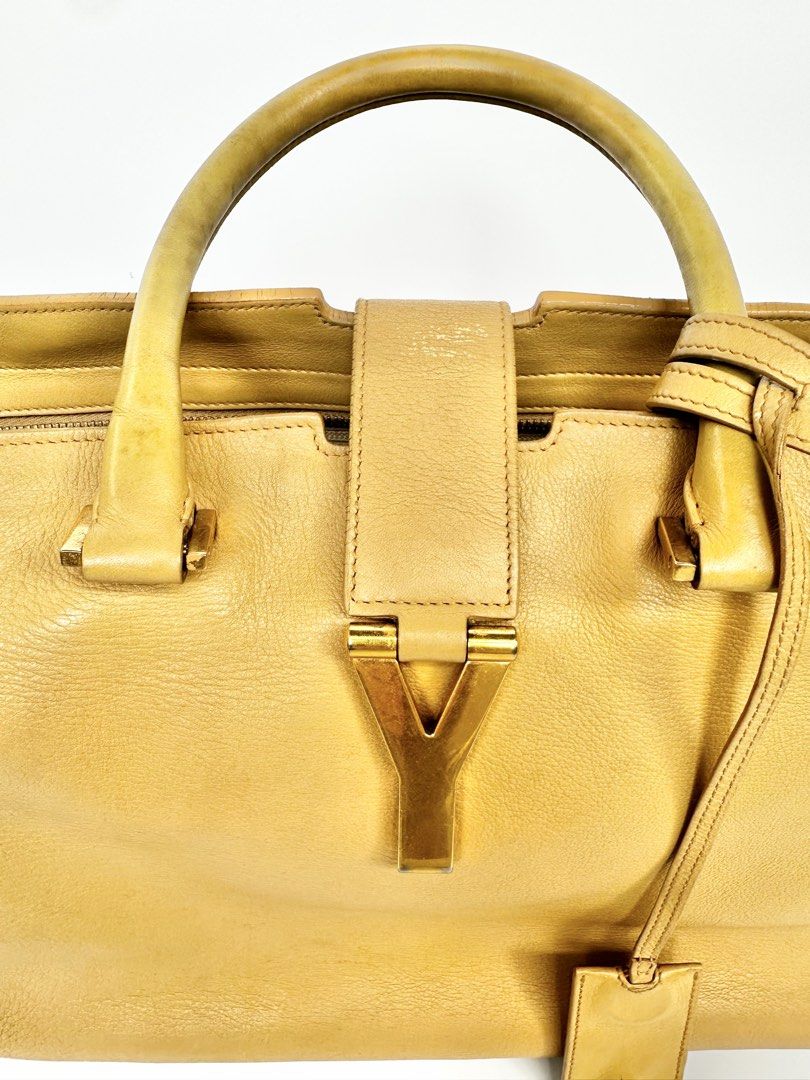 Saint Laurent YSL Cabas Chyc Handbag (Category: Luxury Bags & Wallets) located in Paranaque City. Submitted by gabprelovedstuff (Listing ID 1430819643, Image 2). Description: Project Bag - needs TLC from bag spa hence low price - Medium Size - Features the iconic YSL logo Price is final.