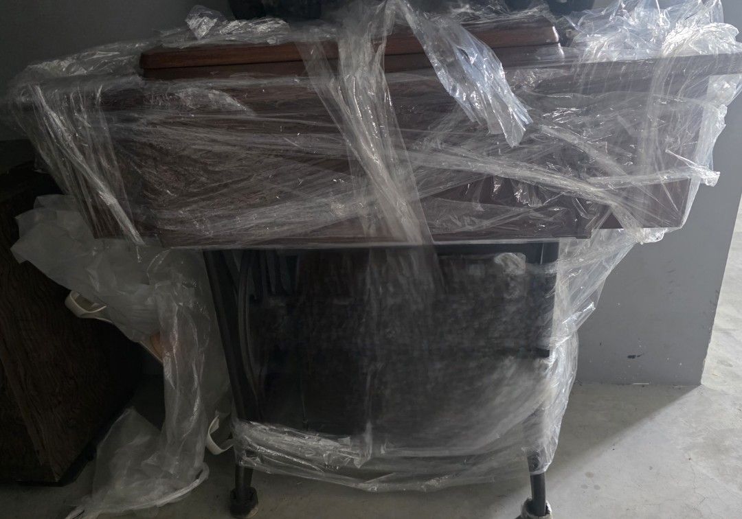Sewing machine table (Category: Other Home Furniture) located in Singapore. Submitted by az_21 (Listing ID 1430883113, Image 1). Description: lighty used wrapped as shown in picture only the table don't have sewing machine..