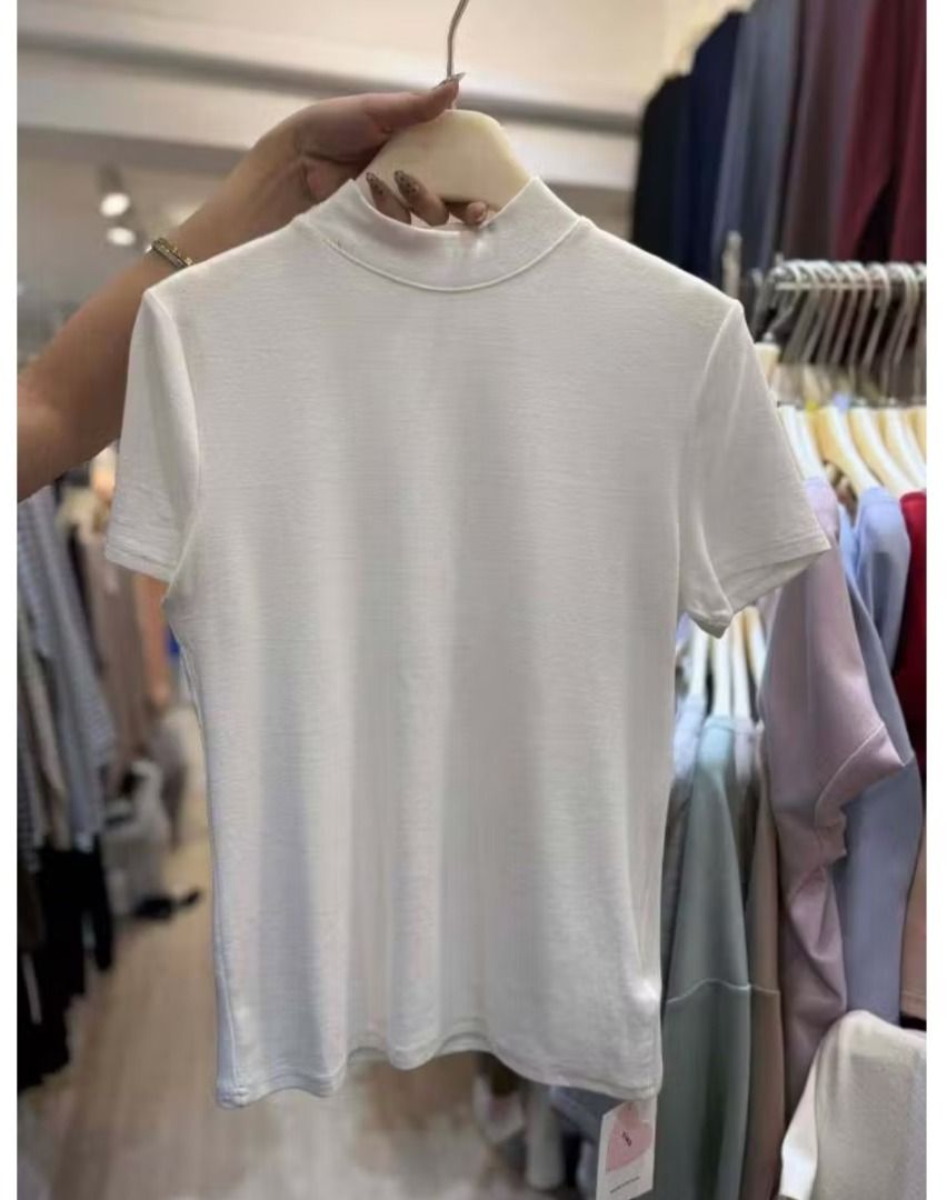 SIWA TURTLE NECK TOP Short sleeve (Category: Tshirts & Polo Shirts ) located in Manila. Submitted by PureWonder_Shop (Listing ID 1430884078, Image 1). Description: Color: White 🤍 Fits SMALL TO LARGE body frame ✨ A simple, versatile top suitable for various outfits. 🧁 FREE SF WITHIN METRO MANILA.