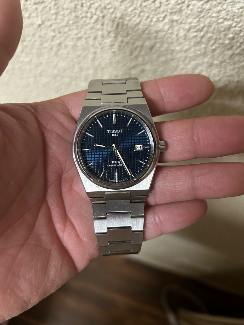 Tissot PRX Powermatic 80 Watch (Category: Luxury Watches) located in Caloocan City. Submitted by zealflower-9bc4 (Listing ID 1430723461, Image 3). Description: Currently selling my Tissot PRX Powermatic 80. It has a blue dial and a stainless steel bracelet. Was purchased in 2023 and is well used. The bracelet does have minor scratches but the sapphire crystal is in pristine condition. Comes with the original box and papers. .