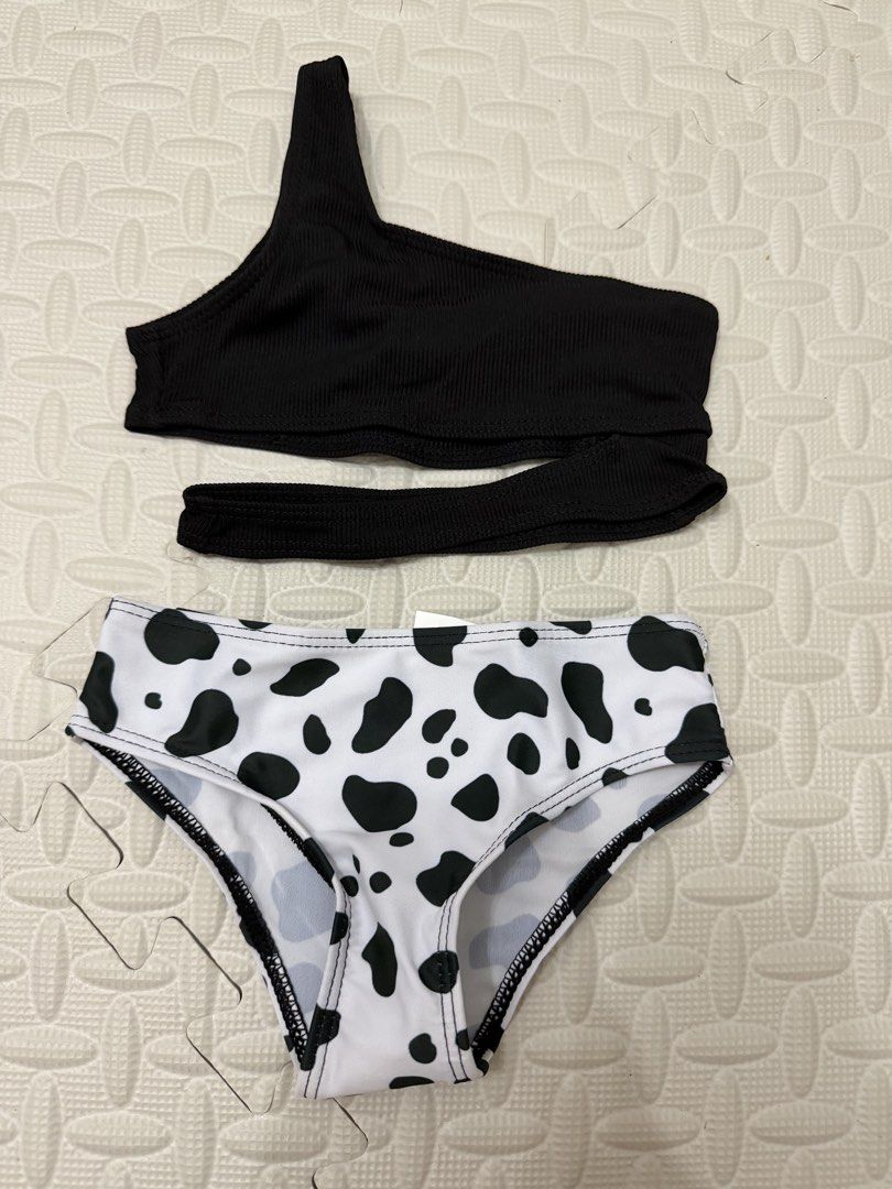Two-Piece Cow Print Swimsuit (Category: Babies & Kids Fashion) located in Quezon City. Submitted by mmdcme (Listing ID 1430921060, Image 2). Description: Size 90 3-12m Brandnew po pero natambak di na ngamit ng anak ko.