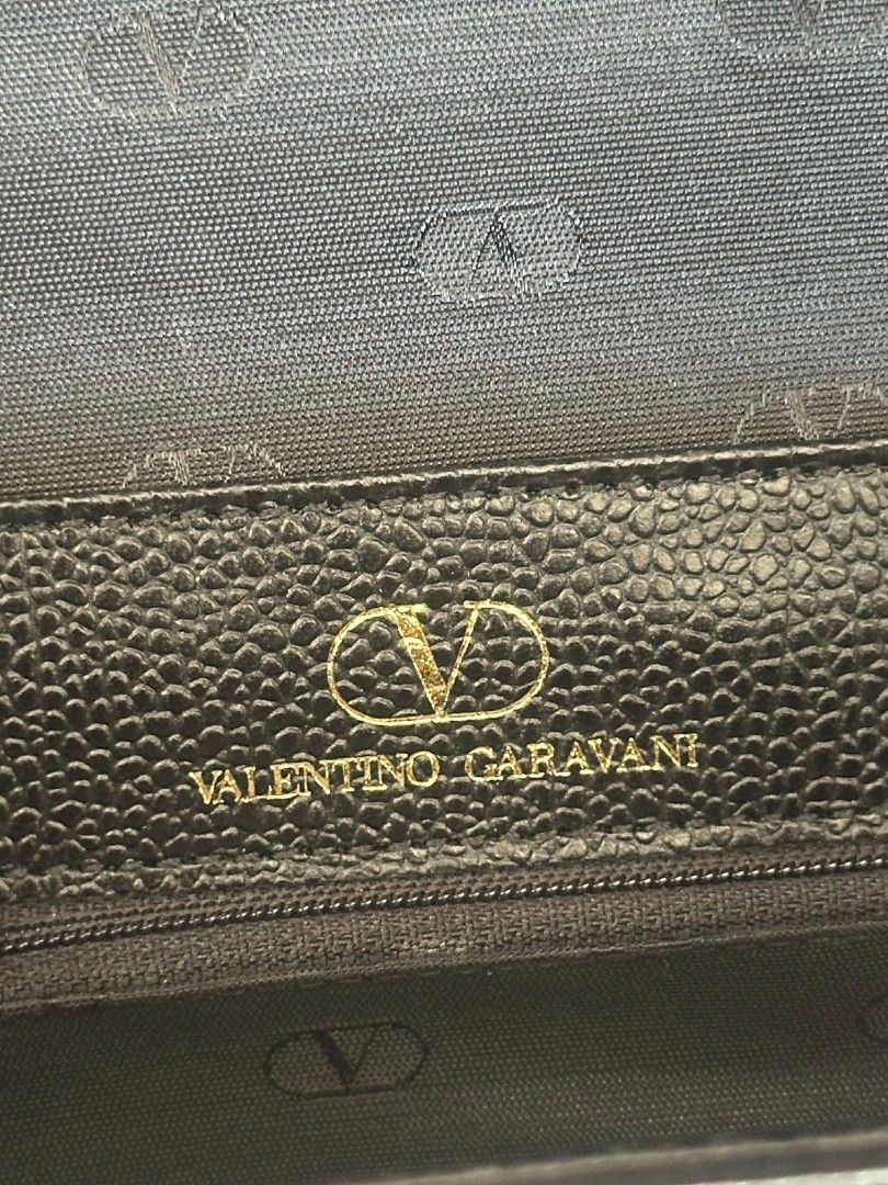 Valentino Garavani Black Handbag (Category: Luxury Bags & Wallets) located in Manila. Submitted by rangya (Listing ID 1430803748, Image 2). Description: Well used condition GUARANTEED ORIGINAL jeo .