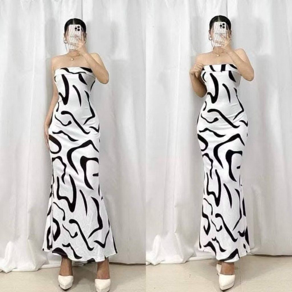 White Printed Tube Dress (Category: Dresses) located in Manila. Submitted by marsmarvelous (Listing ID 1430832733, Image 2). Description: NEVER BEEN WORN 🤗✨ - Uniqmnl White Printed Tube Dress - Free Size - Features a striking black and white abstract print - Flattering tube style - Perfect for a stylish look.