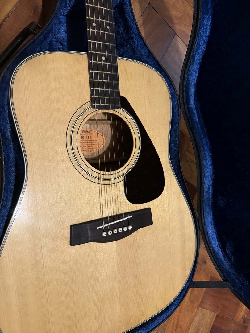 Yamaha FG-151 Acoustic Guitar with Case (Category: Musical Instruments) located in Bulacan. Submitted by paola02 (Listing ID 1430828293, Image 2). Description: Yamaha FG151 Vintage With hard case. Orange label MIJ yamaha dreadnought, with set up na. New strings and low action. Minor scratches only. Ready to play nalang Sure buyer may bawas pa.
