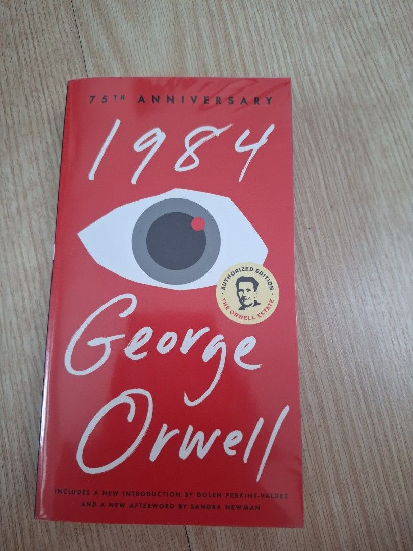 1984 by George Orwell (Category: Storybooks) located in Paranaque City. Submitted by dorothyperalta (Listing ID 1431030404, Image 1). Description: Copy of George Orwell's classic novel, "1984." It is the 75th Anniversary Edition. The cover is red with the title and author's name in white. It includes a new introduction by Doren Perkins-Valdez and a new afterword by Sandra Newman..
