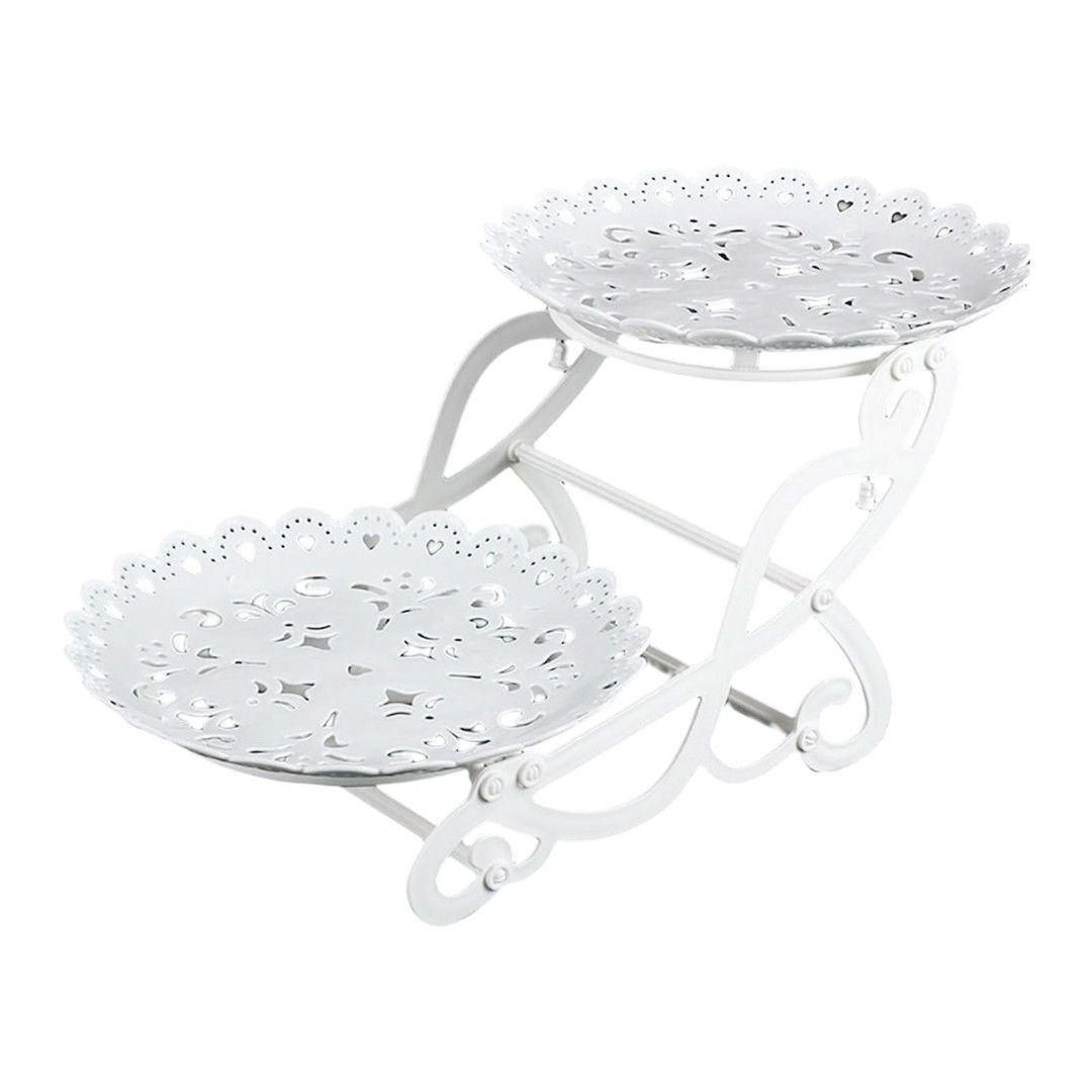 2-Tier Cupcake Holder (Category: Bakeware) located in Quezon City. Submitted by ana-chan (Listing ID 1430994118, Image 1). Description: Elegant 2-tier cake stand, perfect for displaying desserts or appetizers. Features a delicate, lacy design with a white finish. The stand is foldable for easy storage. Ideal for parties, events, or everyday use. It is made of durable material and is easy to assemble..