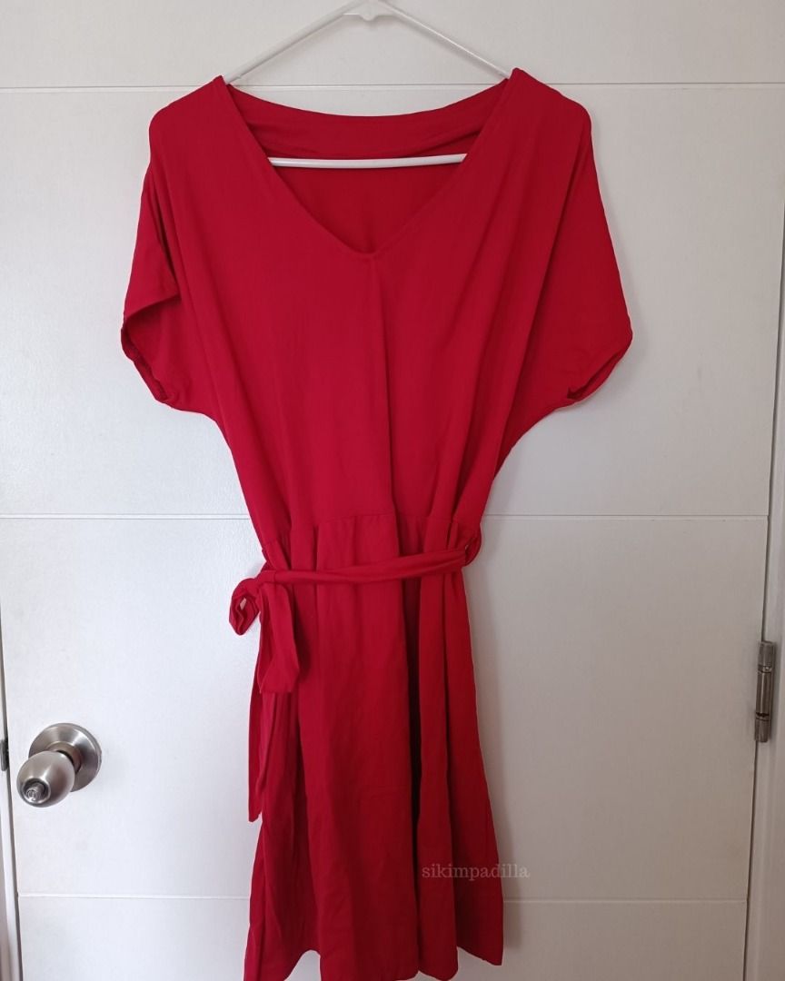 2-Way Red V-Neck Dress (Category: Dresses) located in Mandaluyong City. Submitted by sikimpadilla (Listing ID 1430981448, Image 3). Description: Red dress features a V-neck design and short sleeves. It has a gathered waistline and comes with tie details on the sides. It's a versatile piece suitable for various occasions..