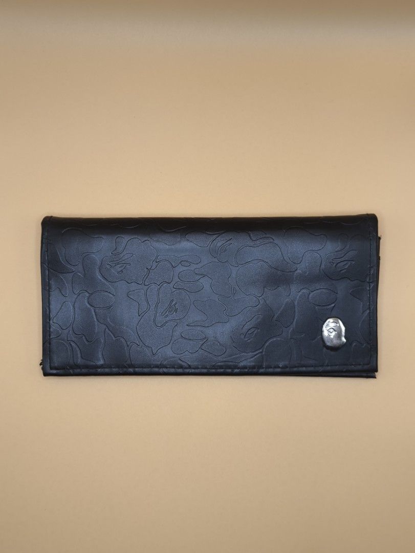 A BATHING APE MAGAZINE RELEASED WALLET (Category: Luxury Bags & Wallets) located in Manila. Submitted by rewearables.mnl (Listing ID 1431082197, Image 1). Description: FOR SALE -A BATHING APE MAGAZINE RELEASED WALLET CONDITION:10/10 COLOR RATE:10/10 ISSUE: MICRO SCRATCHES IN MONKEY LOGO ASKING PRICE:1500 **REWEARABLES PRODUCT DISCLAIMER** All thrift items are pre-loved and may show minor signs of wear or age. Please review photos and descriptions