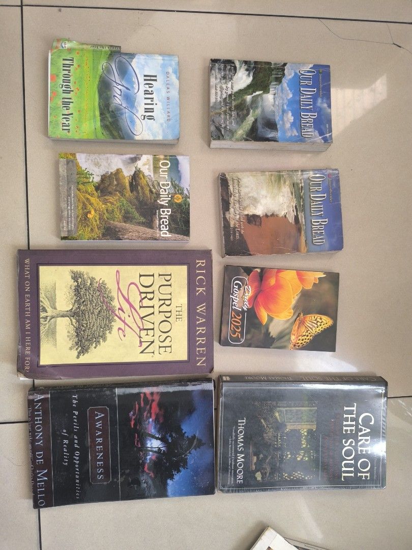 Assorted Devotional Spiritual Christian Books (Category: Religion Books) located in Manila. Submitted by lianlim.mail (Listing ID 1430991092, Image 2). Description: Collection of assorted Christian books, including "Our Daily Bread", "The Purpose Driven Life", "Care of the Soul", "Awareness", and daily devotionals. Titles and authors are visible in the images. Used/dusty condition. take all for 200.