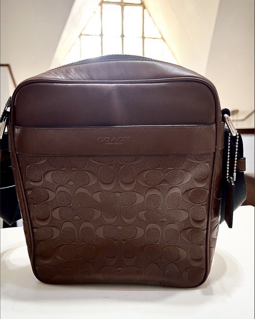 Authentic Coach Charles Flight Bag (Category: Sling Bags) located in Pasig City. Submitted by true_solutionx (Listing ID 1431023248, Image 1). Description: Authentic Crossbody Business small square Coach Bag..