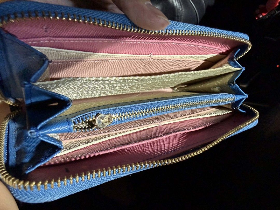 Authentic Long Wallet (Category: Luxury Bags & Wallets) located in Manila. Submitted by fiercetiger_93bbf6 (Listing ID 1431164470, Image 3). Description: Authentic Original Long Wallet Saffiano Leather (genuine leather) Binili ko sa 2nd street japan This is a luxury brand. Pm for more info and price With lots of issue, heavily used. Selling it for a super low price kasi with lots of issues and nawala na din warranty card..