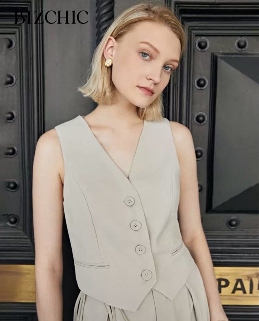 Beige Button Vest (Category: Others Tops) located in Quezon City. Submitted by pgv18 (Listing ID 1431164639, Image 3). Description: Fits XS-M Thick material with lining Like new Can be worn for work or casual days RFS: decluttering.