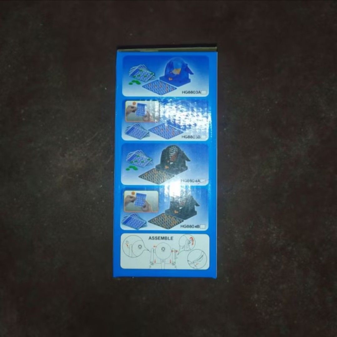 Bingo Lotto Game Set (Category: Board Games & Puzzles) located in Manila. Submitted by shopwithella.ph (Listing ID 1431122389, Image 3). Description: 💯 BINGO LOTTO GAME 75 NUMBERS BRAND NEW 💯 🌟 Please see attached photos for your entertainment 🌟 🌟 Those photos are the actual photos inside. I photographed them on my own. Please do not use for your shop, thank you very much 🌟 🌟 Not branded, but definitely a good quality 🌟 WHAT'S INSIDE? ❤️ 