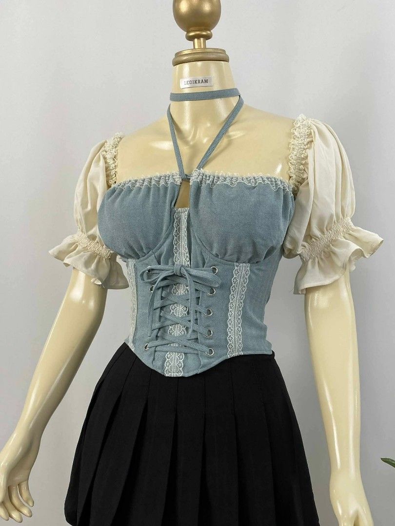Blue & White Coquette Corset Top (Category: Others Tops) located in Taguig. Submitted by cinnamoncloud (Listing ID 1431098679, Image 1). Description: - bought from Altered Edition from FB - this is the picture posted from the page - inclusions top & choker - size is Small to Medium, it can be adjusted at the back and front - price 500, OG price 680 pesos can haggle ☺️ - never worn outside, only worn for fitting - no stains/tears/damage - w/ real 