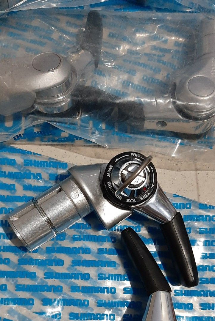 BNEW DURA ACE 10s BAR-END SHIFTERS (Category: Bicycles) located in Bulacan. Submitted by tsunami_express (Listing ID 1431084621, Image 2). Description: Brand new Shimano Dura Ace Bar-End shifters. Dual shifting mode (friction/ index) 10 speed if you set index and might go beyond if you go friction P3,800 price firm.