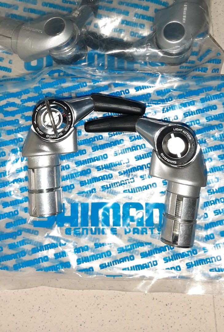 BNEW DURA ACE 10s BAR-END SHIFTERS (Category: Bicycles) located in Bulacan. Submitted by tsunami_express (Listing ID 1431084621, Image 3). Description: Brand new Shimano Dura Ace Bar-End shifters. Dual shifting mode (friction/ index) 10 speed if you set index and might go beyond if you go friction P3,800 price firm.