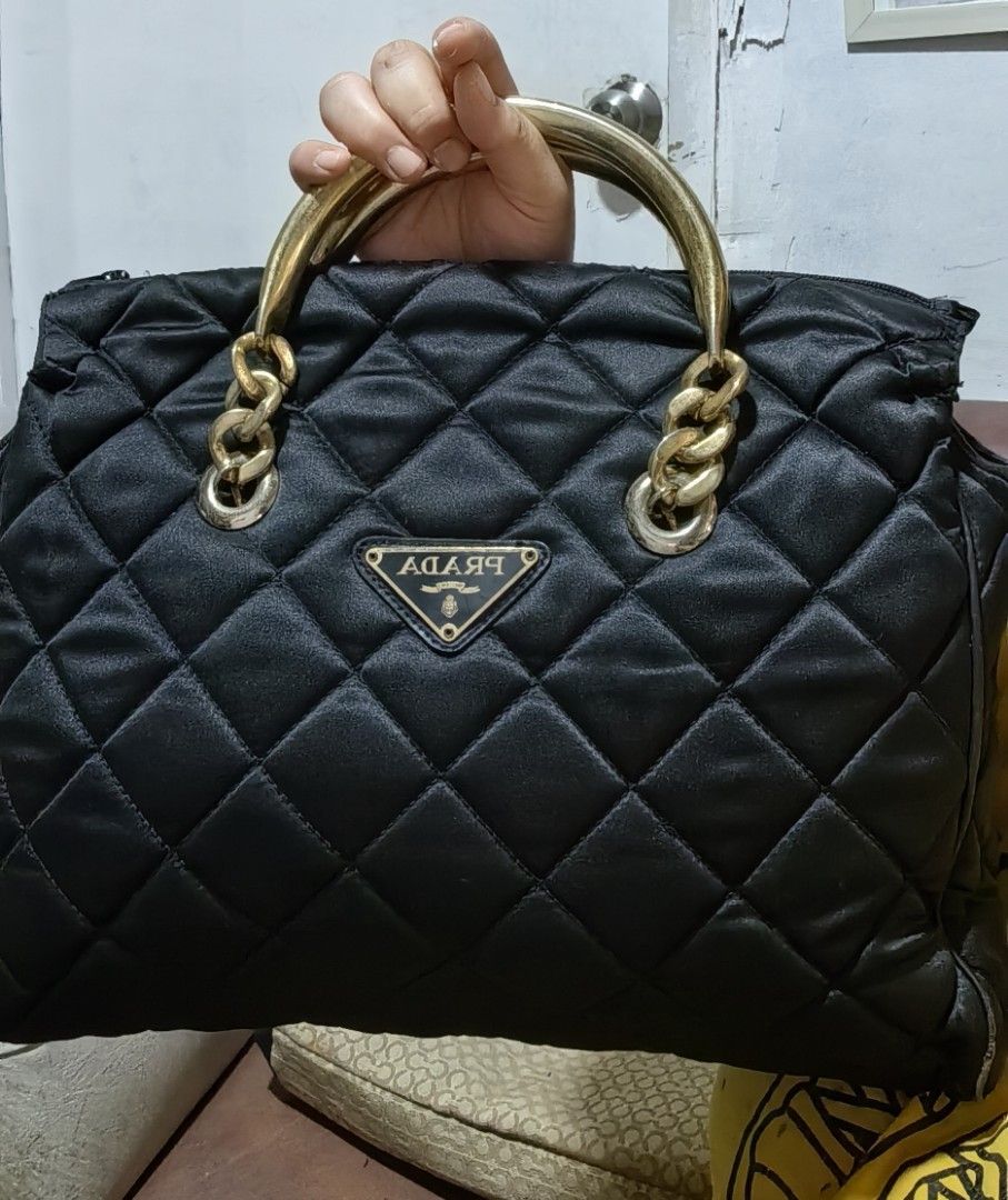 Boston prada nylob (Category: Luxury Bags & Wallets) located in Bacolod City. Submitted by darriebags88 (Listing ID 1431069121, Image 2). Description: slight fadings only sa handle.