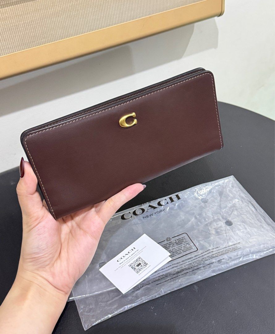 Brandnew Coach Snap Wallet (Category: Luxury Bags & Wallets) located in Caloocan City. Submitted by pocketstyle (Listing ID 1431145869, Image 1). Description: 100% original Money back guaranteed No inclusions thus selling low.