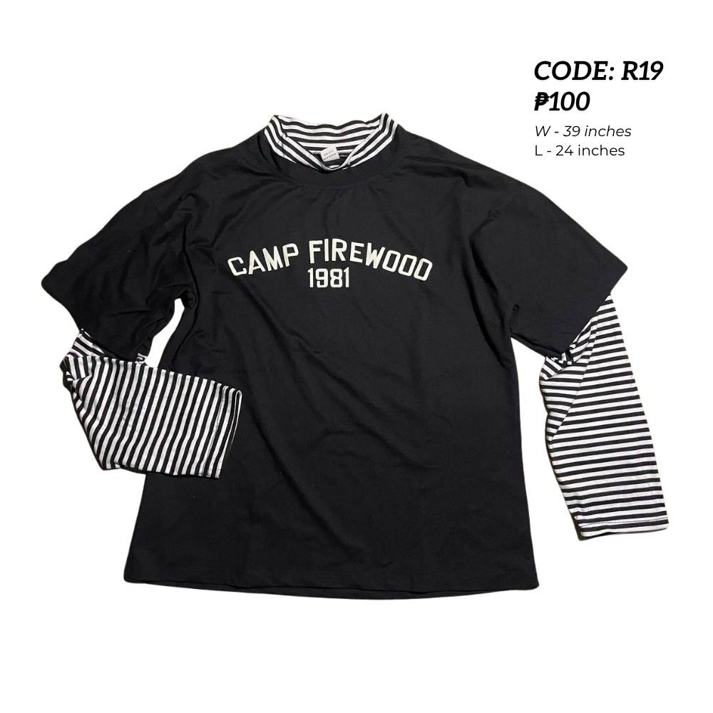 Camp Firewood 1981 Layered T-shirt (Category: Longsleeves) located in Quezon City. Submitted by rackofyuu (Listing ID 1429997981, Image 1). Description: MOP: GCash Black layered t-shirt with a striped long-sleeved undershirt. Features the text "CAMP FIREWOOD 1981" printed on the front. The shirt has a mock neck collar with a striped pattern. The sleeves are short, and the undershirt sleeves are long and striped..