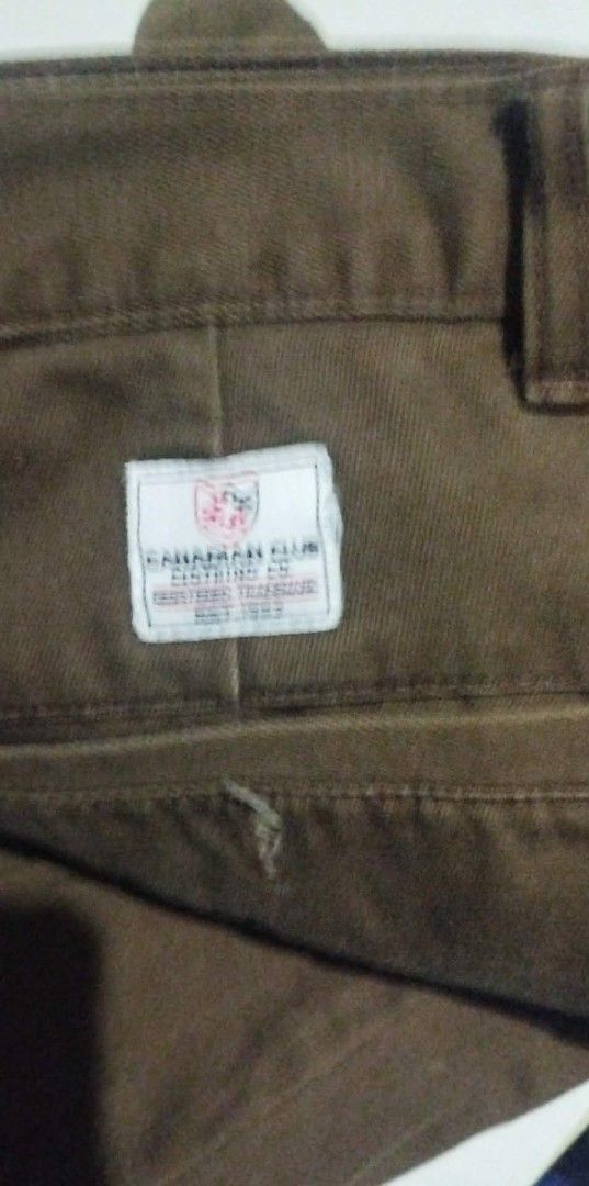 Caravan Club Brown Pants (Category: Trousers) located in Manila. Submitted by deguzmandh17516 (Listing ID 1431162115, Image 2). Description: Brown pants from Caravan Club. The pants have a classic design with a straight leg cut. The pants have a button and zipper closure. The label is visible in the image..
