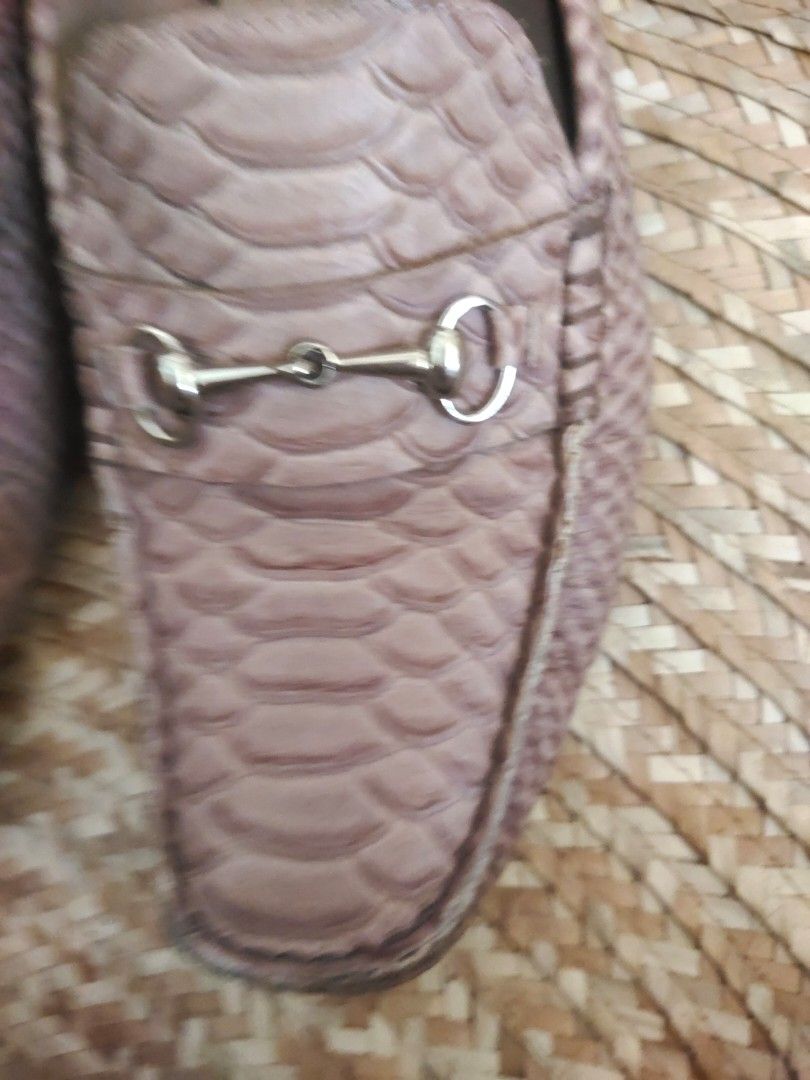 Cole Haan Snake Skin Loafers (Category: Loafers) located in Alaminos. Submitted by adornaura (Listing ID 1431035547, Image 2). Description: Cole Haan loafers with a snake skin pattern. Features a silver-tone metal bit detail. The shoes are marked as made in India. The soles have a rubber grip. The size is 7.5A. The interior shows some wear. The exterior shows some wear as well..