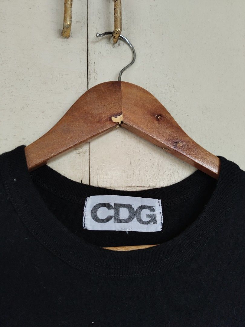 Comme Des Garcons (Category: Luxury Apparel) located in Bocaue. Submitted by ukaynipepe (Listing ID 1431088694, Image 3). Description: Comme des garcons Probably small Width 18.5 Length 26 Cut size tag and washtag 10/10 color rate.