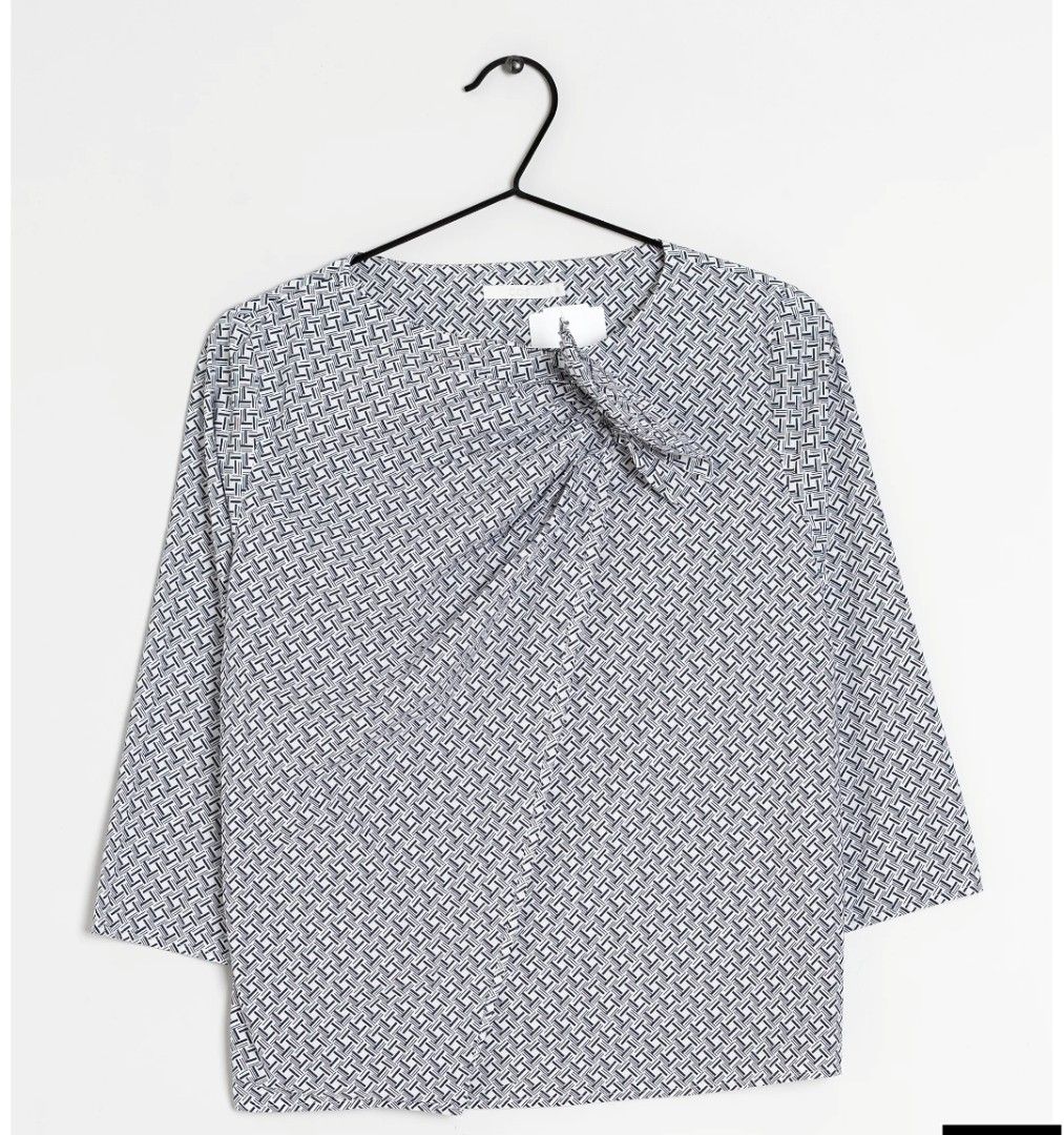 COS Geo print wrap top (Category: Blouses) located in Quezon City. Submitted by chph2nd (Listing ID 1431142228, Image 1). Description: .