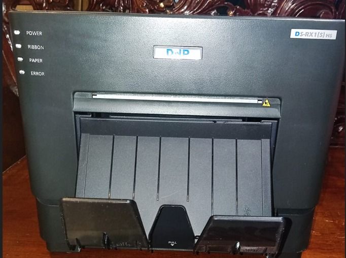 DNP DS-RX1HS Photo Printer (For Photobooth) (Category: Printers, Scanners & Copiers) located in Manila. Submitted by geraldinec73946 (Listing ID 1431155755, Image 2). Description: Selling PRINTER DNP DS- RX1HS(used only once). One roll allows you to make 700 prints in 4×6″ format. In addition, the set contains two coloring foils. It comes with 1 Roll (used) remaining of 660 prints. Rfs: Another business .