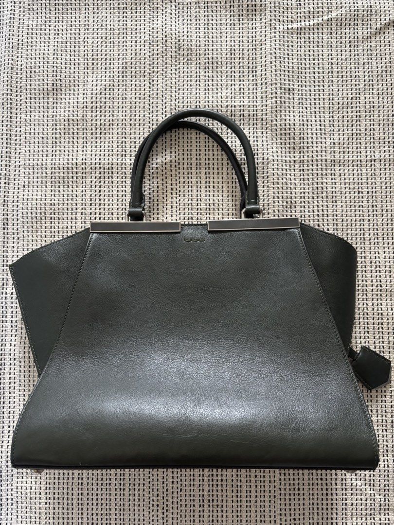 Fendi 3 jours (Category: Luxury Bags & Wallets) located in Los Banos. Submitted by declutterlistt (Listing ID 1430997695, Image 2). Description: Selling my moms old Fendi 3 jours in dark green - signs of usage - no inclusions - needs cleaning/restoration.