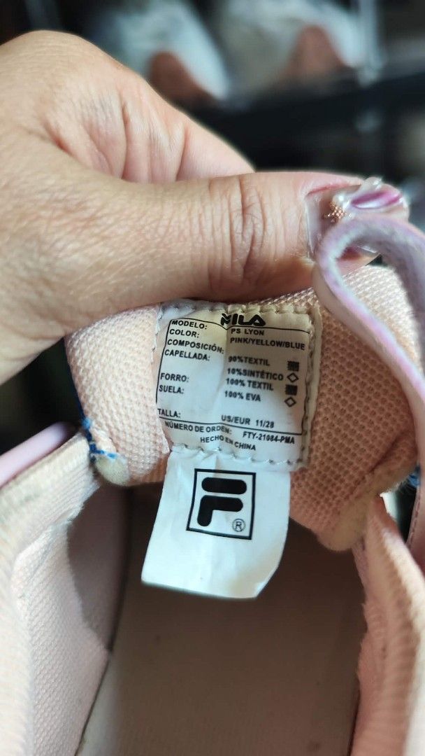 Fila Kids Shoes (Category: Babies & Kids Fashion) located in Cavite. Submitted by nesstuffandeverything (Listing ID 1431117962, Image 2). Description: - Fila kids shoes - Color: Pink and Orange - Size: US 11 / 28 - Features hook-and-loop strap - Fila logo detail - Mesh upper - White sole - Made in China.