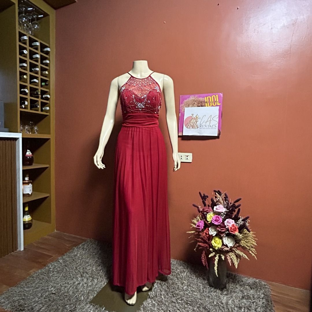 [FOR RENT] Red Embellished Evening Gown (Category: Evening dresses & gowns) located in Manila. Submitted by collette.cas (Listing ID 1431028656, Image 1). Description: Elegant red evening gown with a halter neckline. The bodice is embellished with intricate details. Rental fee for 2-3 days, with a refundable deposit. Kindly DM to inquire..