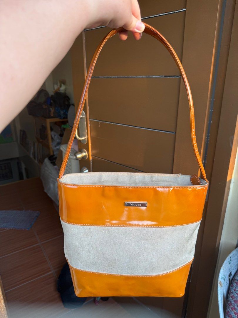 Gucci Shoulder Bag (Category: Luxury Bags & Wallets) located in Paranaque City. Submitted by lyn0618 (Listing ID 1431095215, Image 1). Description: FOR SALE ! GUARANTEED. AUTHENTIC. GUCCI SHOULDER BAG. in ENAMEL , SUADE leather ISSUE: PEELING. OFF INISDE leather . powderize. NAGBABAKBAK. pero Hindi butas . WORKING ZIPPER SHOULDER HANDLE in GOOD CONDITION. Zippered POCKET inside CODE is VISIBLE. see PICTURE. PROJECT BAG . PROJECT BAG ! 💼 PASS SA 