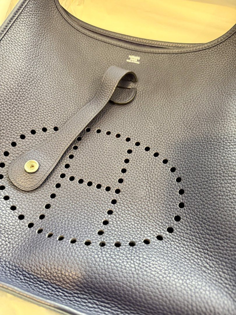 Hermes Evelyn (Category: Luxury Bags & Wallets) located in Manila. Submitted by rmx28 (Listing ID 1431039084, Image 2). Description: Authentic Hermes Evelyn No damage With Hermes scarf that can be used as strap (shoulder).