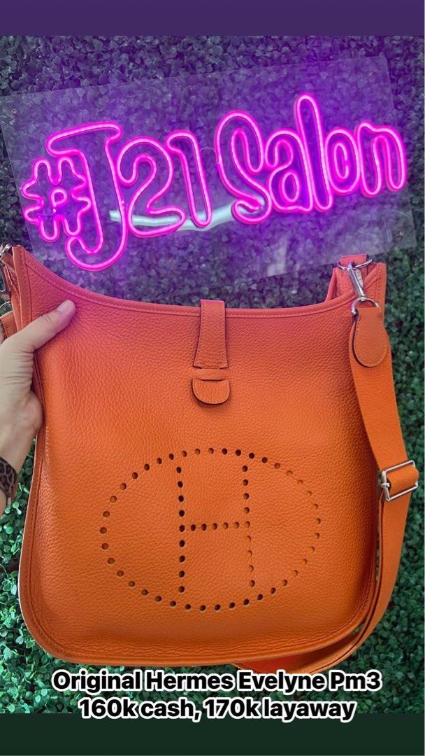 Hermes Evelyne PM3 Orange Handbag (Category: Luxury Bags & Wallets) located in Manila. Submitted by jonalyngal75237 (Listing ID 1431005651, Image 1). Description: Fast break sale! (24 hours only) Excellent used condition With bag organizer, orig dustbag With 2 authenticity cards Guaranteed original.