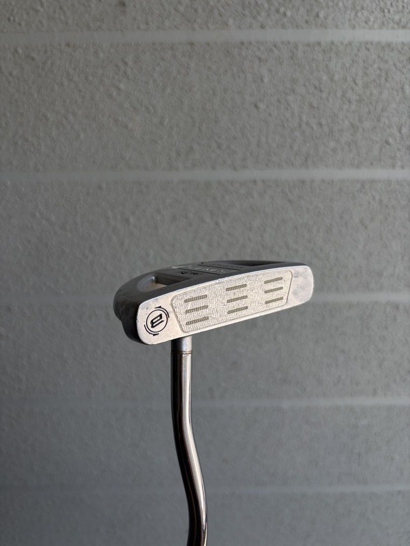 Honma Beres Putter (Category: Golf) located in Santa Rosa. Submitted by rumborro (Listing ID 1430990876, Image 2). Description: - Honma Beres putter - Sleek silver finish - Black grip with white accents and Honma logo - Includes matching head cover - Unique curved shaft design - Honma Beres logo and model number on the head.
