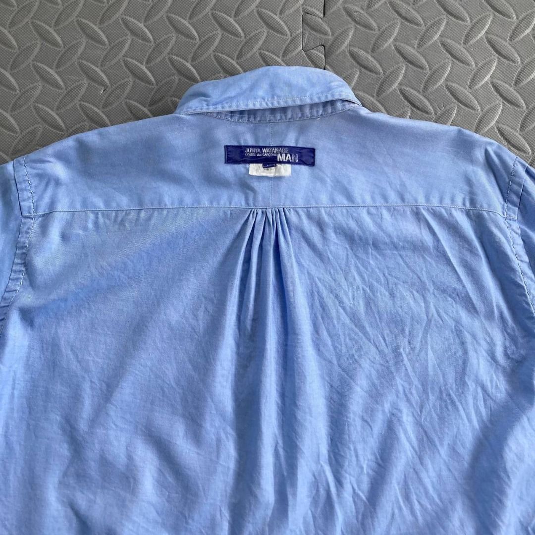 Junya Watanabe Man - 2018 Reversible Contrast Stitch Button-Down Shirt (Category: Formal Shirts) located in Quezon City. Submitted by archived.g (Listing ID 1431152994, Image 3). Description: Junya Watanabe Man - 2018 Reversible Contrast Stitch Button-Down Shirt - Brand: Junya Watanabe Man Made in: Japan Year: 2018 Material: Cotton Color: Blue Size on tag: Medium Sizing: Measurements (flat, not stretched): Shoulders: 17” Sleeves: 24.5” Width: 21.