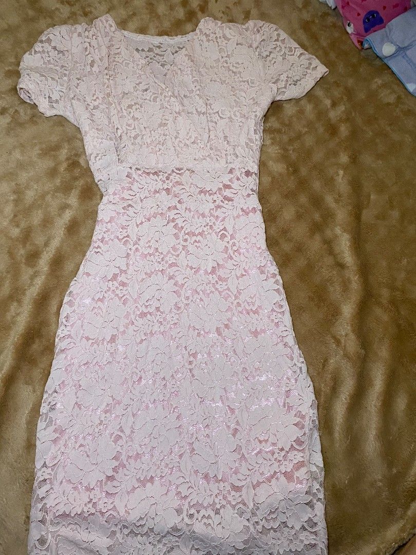 Lace Dress - Pink (Category: Dresses) located in Quezon City. Submitted by reveuses (Listing ID 1431095561, Image 1). Description: Elegant pink lace dress. Features a delicate floral lace pattern. The dress has short sleeves and a flattering silhouette. Perfect for special occasions or a romantic evening out. A timeless piece that adds a touch of sophistication to any wardrobe..