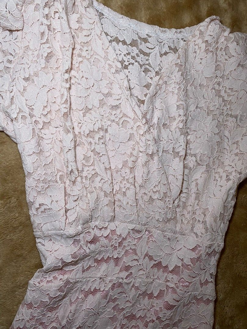Lace Dress - Pink (Category: Dresses) located in Quezon City. Submitted by reveuses (Listing ID 1431095561, Image 2). Description: Elegant pink lace dress. Features a delicate floral lace pattern. The dress has short sleeves and a flattering silhouette. Perfect for special occasions or a romantic evening out. A timeless piece that adds a touch of sophistication to any wardrobe..