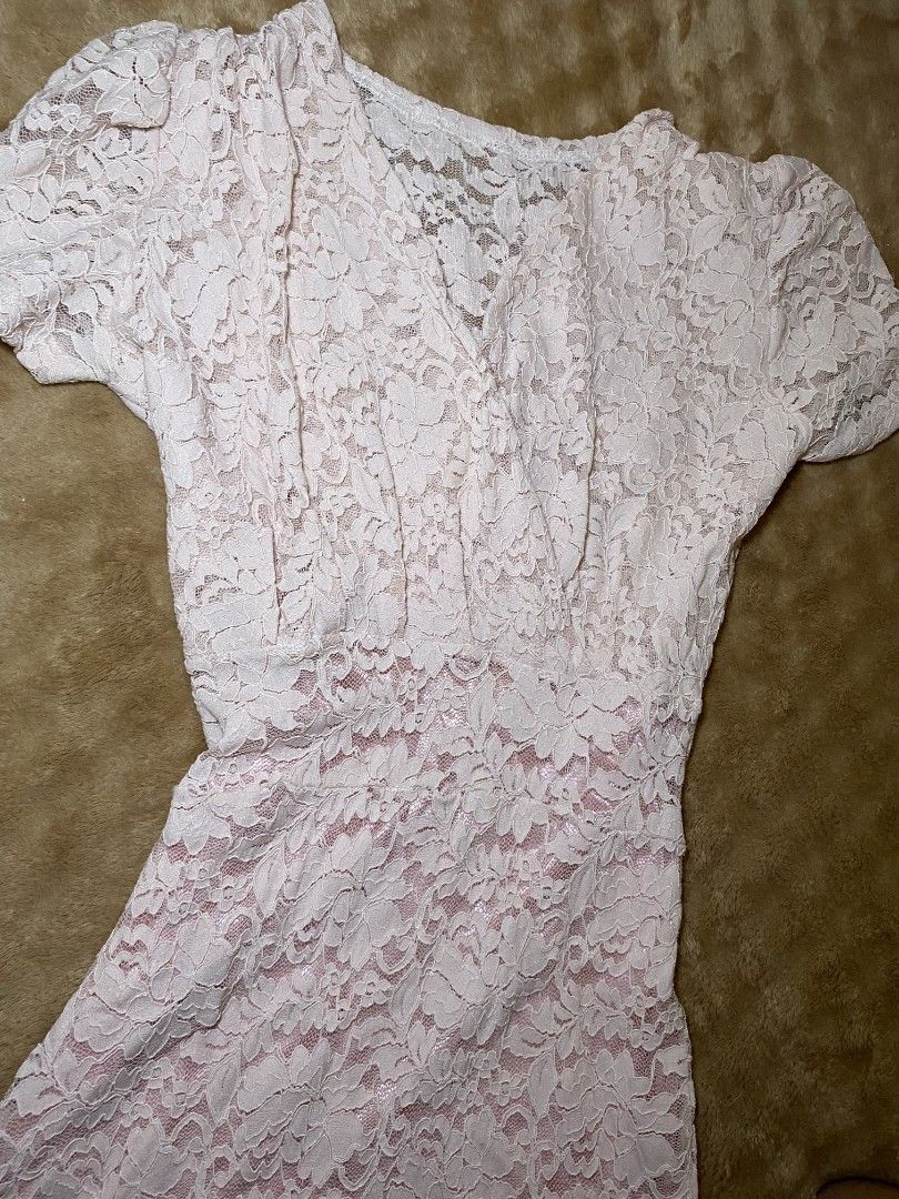 Lace Dress - Pink (Category: Dresses) located in Quezon City. Submitted by reveuses (Listing ID 1431095561, Image 3). Description: Elegant pink lace dress. Features a delicate floral lace pattern. The dress has short sleeves and a flattering silhouette. Perfect for special occasions or a romantic evening out. A timeless piece that adds a touch of sophistication to any wardrobe..