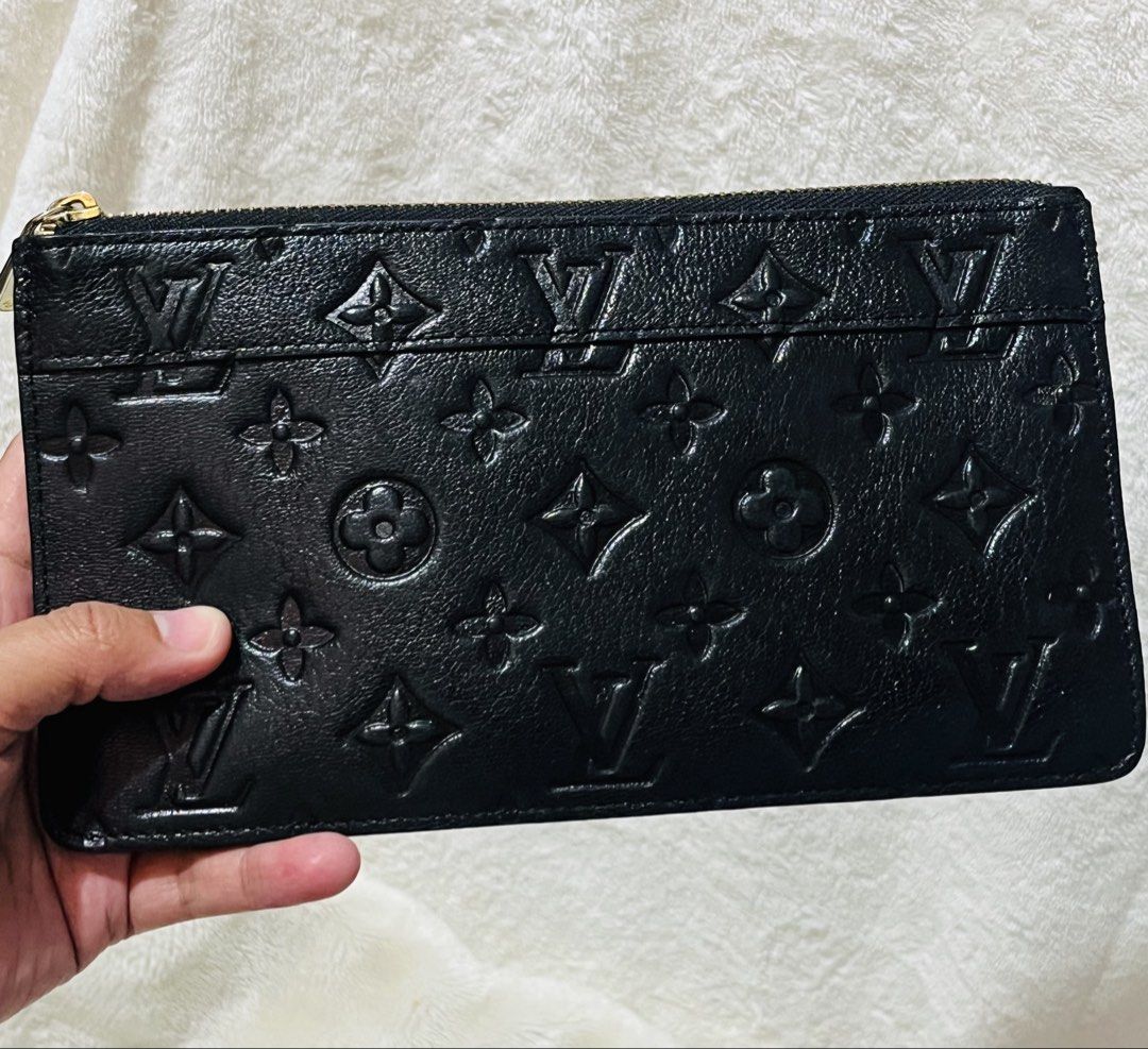 Louis Vuitton Black Embossed Wallet (Category: Ear Care) located in Mandaue City. Submitted by chuchi152615 (Listing ID 1431029146, Image 2). Description: .