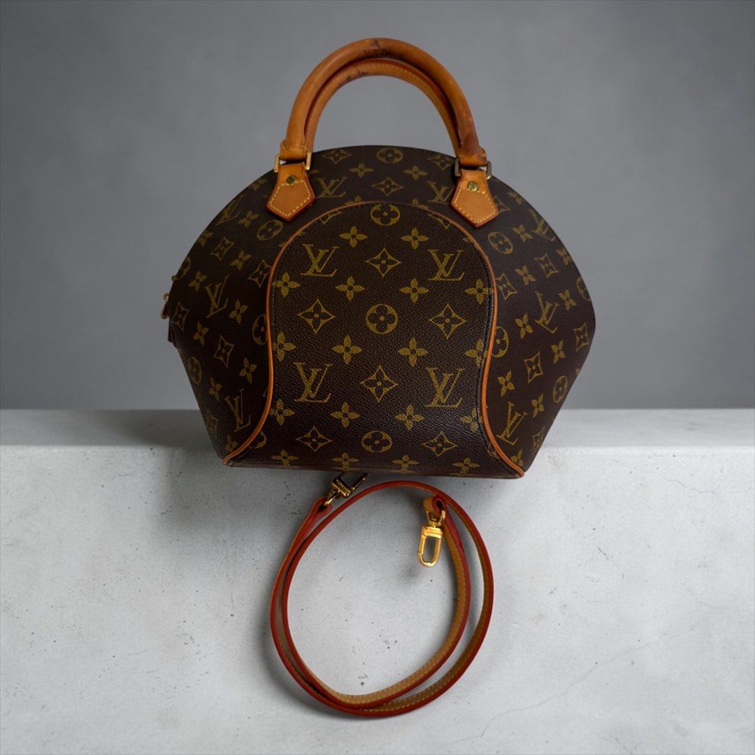 Louis Vuitton Monogram Ellipse Handbag (Category: Luxury Bags & Wallets) located in Cabanatuan. Submitted by iamparislorenzo (Listing ID 1431078032, Image 2). Description: Louis Vuitton Monogram Ellipse handbag. Features the iconic monogram canvas, a rounded shape, and a top handle. Includes a detachable shoulder strap. The bag has a brown leather trim and gold-tone hardware. The interior lining is red. A classic and stylish piece..