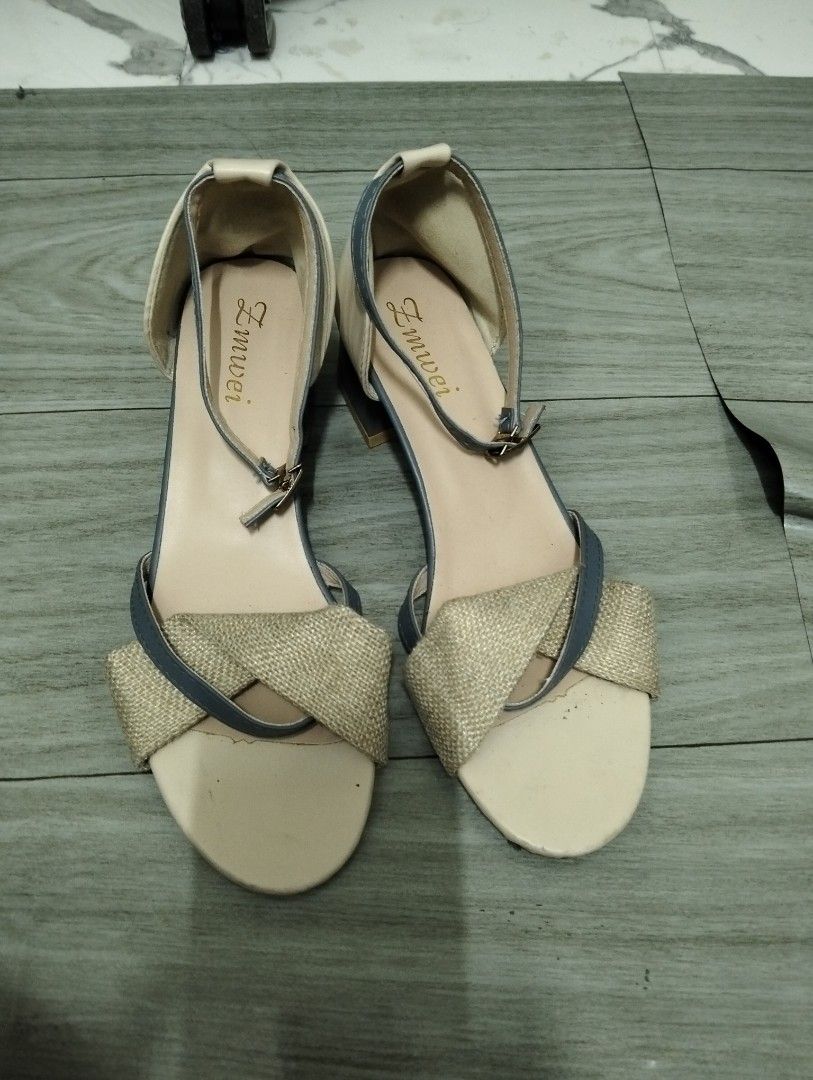 Lumei Beige and Blue Sandals (Category: Flats & Sandals) located in Gasan. Submitted by AngeliqueKaye (Listing ID 1431090803, Image 1). Description: Used once only.Elegant sandals featuring a beige and blue color scheme. The sandals have a strap around the ankle and a bow detail on the front. The brand name "Lumei" is visible on the insole. They have a small block heel for added comfort and style. Perfect for a casual or semi-formal look..